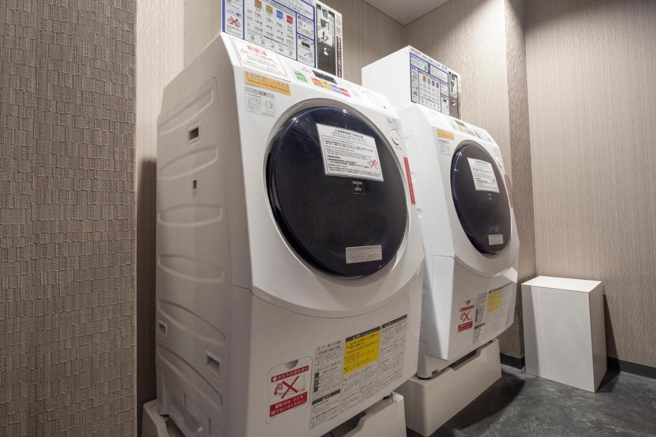 The Royal Park Hotel Iconic Kyoto Exterior photo A washing machine