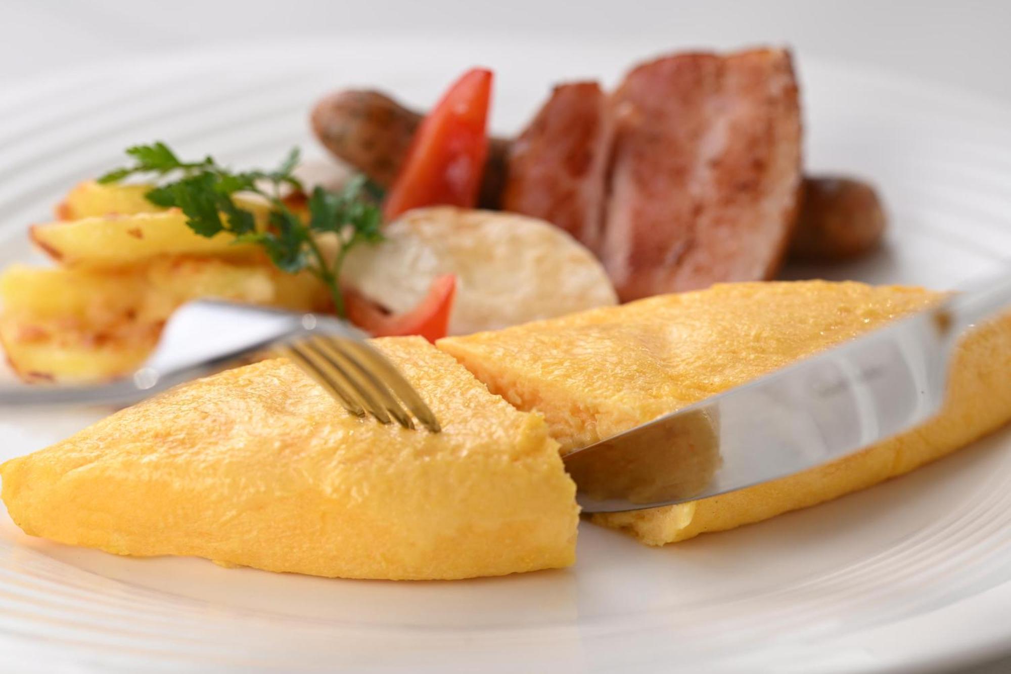 The Royal Park Hotel Iconic Kyoto Exterior photo A potato omelette